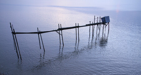 Fototapeta na wymiar Carrelets après le tempête