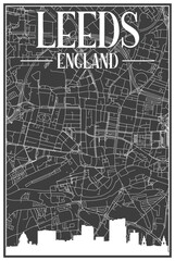 Black vintage hand-drawn printout streets network map of the downtown LEEDS, ENGLAND with brown 3D city skyline and lettering