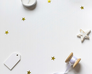 Christmas celebration concept frame with golden and white decoration on the table. Copy space	