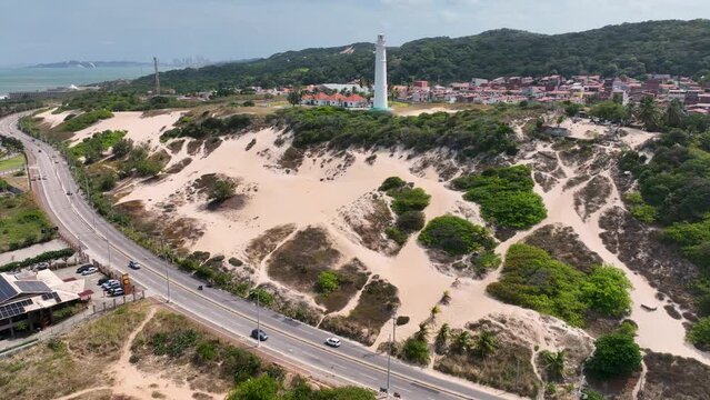 Natal Rio Grande do Norte. Natal Brazil. Panning wide cityscape of Luiza Mother Lighthouse at top of due at Natal Brazil. Rio Grande do Norte state. Travel destination. Tropical scenery. 