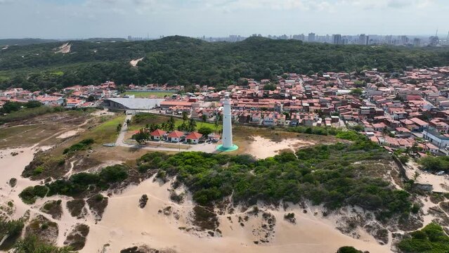 Natal Rio Grande do Norte. Natal Brazil. Panning wide cityscape of Luiza Mother Lighthouse at top of due at Natal Brazil. Rio Grande do Norte state. Travel destination. Tropical scenery. 