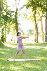 Pretty slim perfect body asian women wear sportswear to playing basic yoga compose.