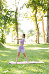 Fototapeta premium Pretty slim perfect body asian women wear sportswear to playing basic yoga compose.
