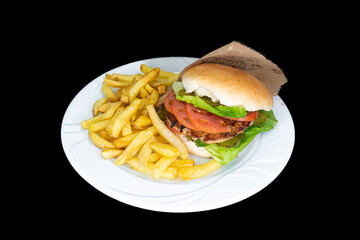 Chicken meatball burger in a white plate on a black background