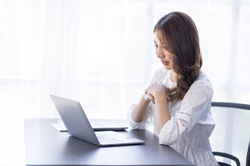 Happiness Entrepreneur beautiful business asian young woman working with laptop at workplace, Small Business Startup, online banking tax, accounting, financial concept.