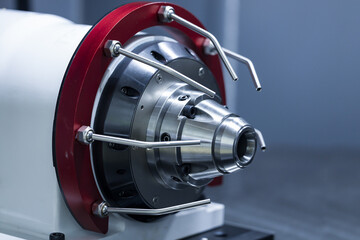 Fototapeta premium CNC machine. Lathe. Metalworking heavy industry. High-tech and high-speed metal processing.