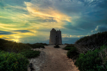 Torre de Ses Portes in the natural reserve of the salt flats of Ibiza. Balearic Islands