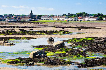 Low tide across the beach at Ballywalter village on the Irish Sea coast of the Ards peninsula,...