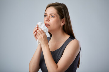 Sick coughing business woman using napkin. isolated advertising portrait.