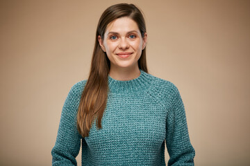 Happy woman in warm knitted sweater. Advertising female studio portrait.