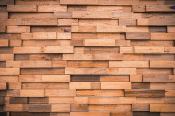 Textured background of horizontal brown plank wall 
stacked together in layers. wooden wall background