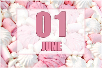 calendar date on the background of white and pink marshmallows.  June 1 is the first day of the month