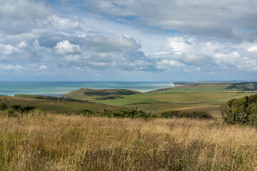 Fototapeta na wymiar the rolling hills and meadows of the Jurassic Coast on the English Channel coast of East Sussex