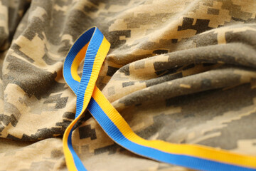 Pixeled digital military camouflage fabric with ribbon