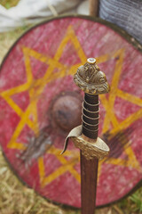  Decorative sword and shield of Vikings. Viking Festival in Denmark