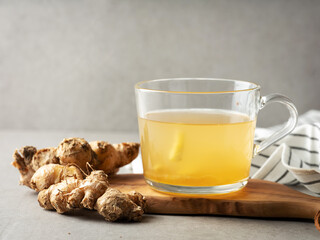 Ginger, warm ginger tea in a cup