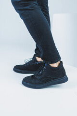 Men's casual shoes in black color made of genuine leather, men on shoes in black lace shoes. High quality photo