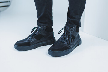 Men's casual shoes in black color made of genuine leather, men on shoes in black lace shoes. High quality photo
