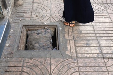 Broken sidewalk tripping hazard