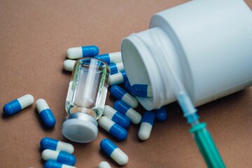 Closeup of medicine treatment or illegal doping pills in sports
