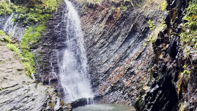 Waterfall Zhenetskyi Huk or Guk in the Carpathians mountains