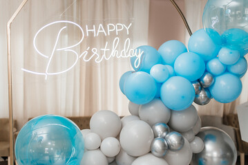 Birthday decorations with balloons, gifts, toys, garla candy for yearling, little baby party