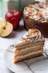 A yummy moist layered cake with buttercream frosting on a marble push plate, close up view for a cuisine art magazine