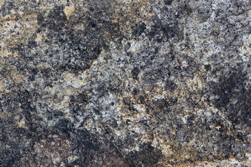 the natural stone wall background or texture