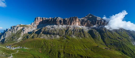 Papier Peint photo autocollant Dolomites The landscape of the Dolomites seen from the Sella group: one of the most famous and spectacular mountain massifs in the Alps, near the town of Canazei, Italy - July 2022.