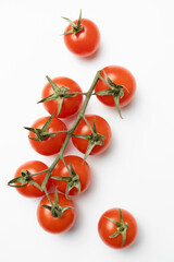 Bunch of fresh, red tomatoes isolated on white background, organic food