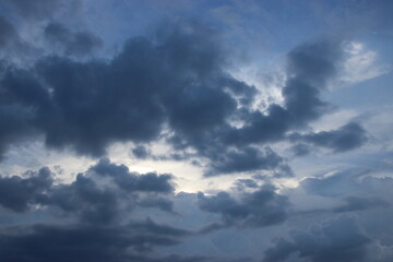 Naklejka na ściany i meble dark blue cloud with white light sky background and midnight evening time 