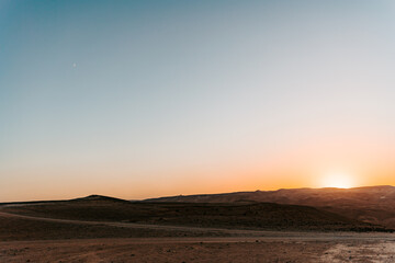 Fototapeta premium Sunset + moon in the Judean Wilderness - Israel 2022