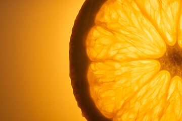 Slice of fresh juicy orange fruit close up on orange background. Macro photography concept. 