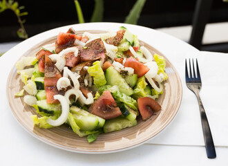 vegetarian healthy vegetable salad on brown plate