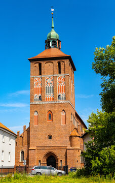 St. John Evangelist church Kosciol Sw. Jana Ewangelisty aside Plac Konstutucji square in historic old town center of Bartoszyce in Poland