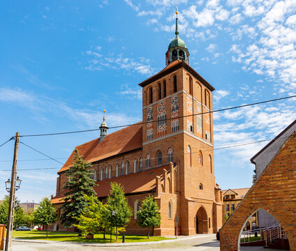 St. John Evangelist church Kosciol Sw. Jana Ewangelisty aside Plac Konstutucji square in historic old town center of Bartoszyce in Poland