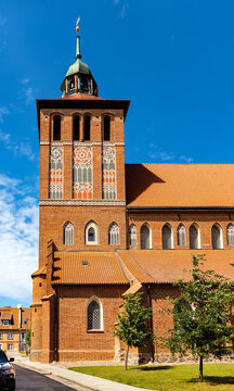 St. John Evangelist church Kosciol Sw. Jana Ewangelisty aside Plac Konstutucji square in historic old town center of Bartoszyce in Poland