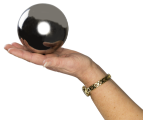 A well groomed woman's hand with a gold wristwatch holds a ball. Transparent background for photo collages.