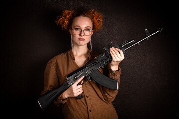 Fototapeta premium Armed woman