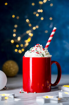 Hot chocolate with whipped cream. Seasonal, winter or Christmas coffee drink with sprinkles.
