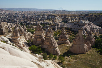 View from the observation deck to strange beautiful landscape with majestic rock formations at Goreme, Cappadocia, Turkey