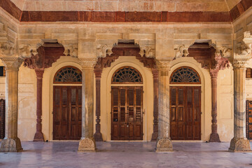 Detail and close-up view of the exquisite architectural work on the walls of the amber palace in Jaipur.