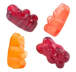 Poster Collection of jelly gummy bears candies isolated on a white background. Colorful fruit gum candies. © domnitsky