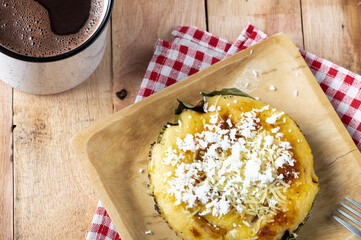 Bibingka commonly refers to a type of baked rice cake from the Philippines that is traditionally cooked in a terracotta oven lined with banana leaves and is usually eaten for breakfast or as merienda 