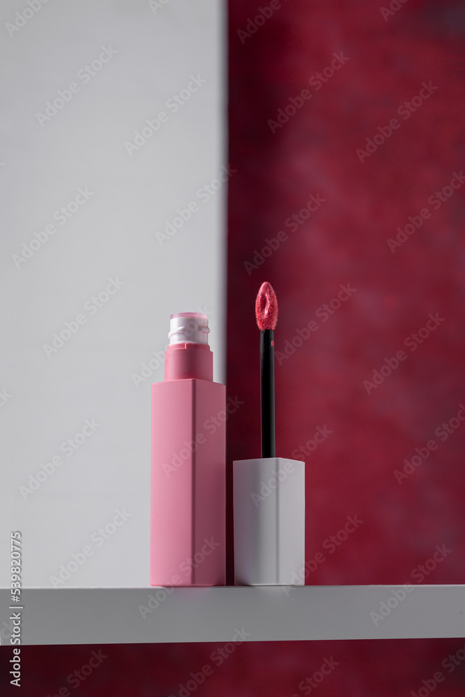 Wall mural Liquid lipgloss applicator and tube, beauty make up product.