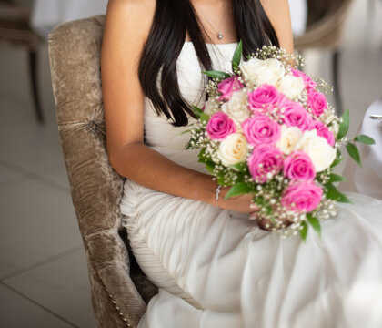 Young asian bride posing. Wedding photo.