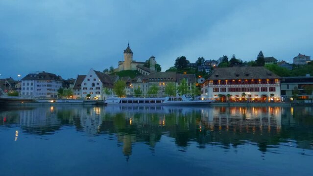 Timelapse of embankment in Schaffhausen during sunset with Munot Fortress