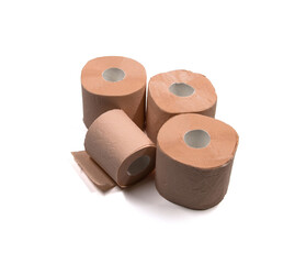 Four rolls of orange toilet paper.