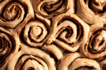photo of cinnamon rolls, a sweet baked dessert, filling pastry