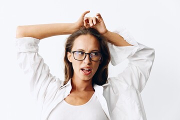 Woman portrait with tanned skin wearing eyeglasses on white background smiling